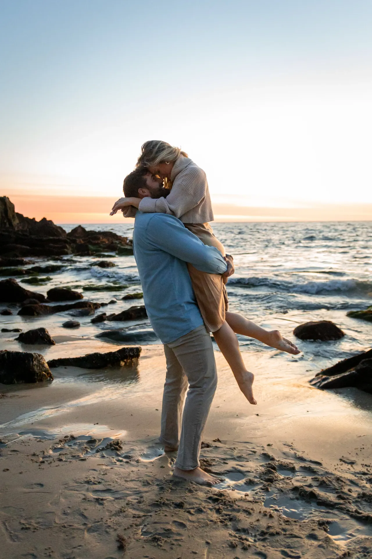 Micah and Hannah at golden hour, about to kiss.