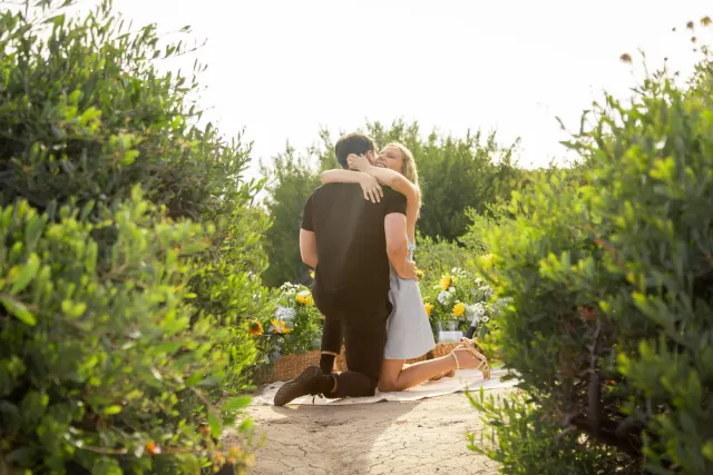 A first kiss, the couple in white.
