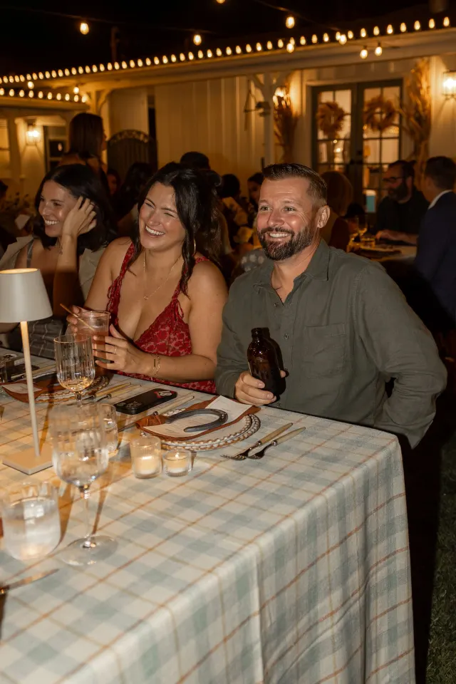 A young family together, parents and their children.