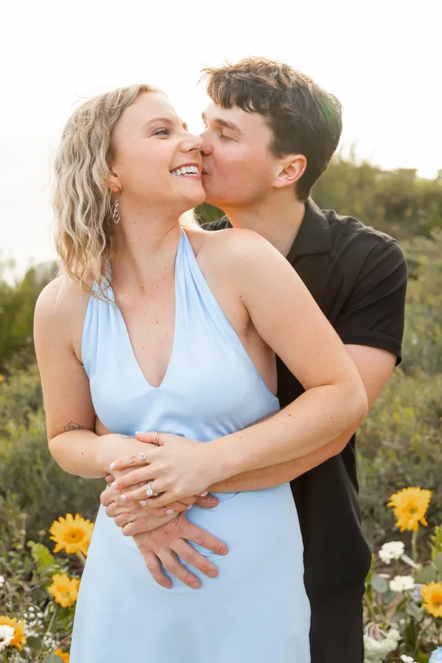 The couple, close and laughing.